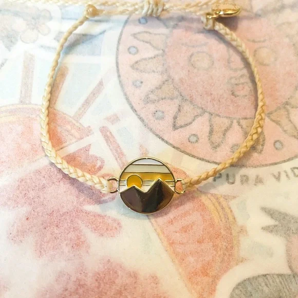 Pura Vida “Twin Peaks” with cream colored bitty braid beacelet - Picture 2 of 4